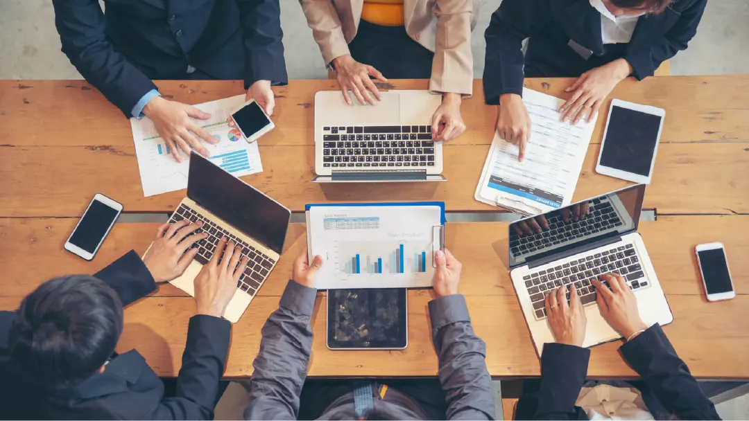 people working together in business